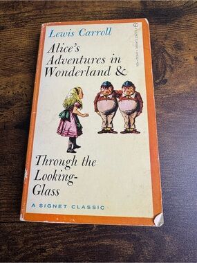 Alice’s Adventured in Wonderland Through  The Looking Glass Paperback Book